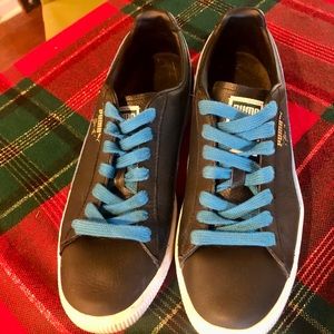 Puma Clyde black with blue accent shoes.